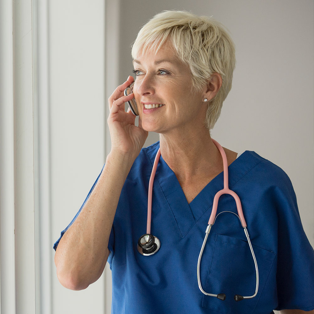 female doctor on her tablet following up with a patient