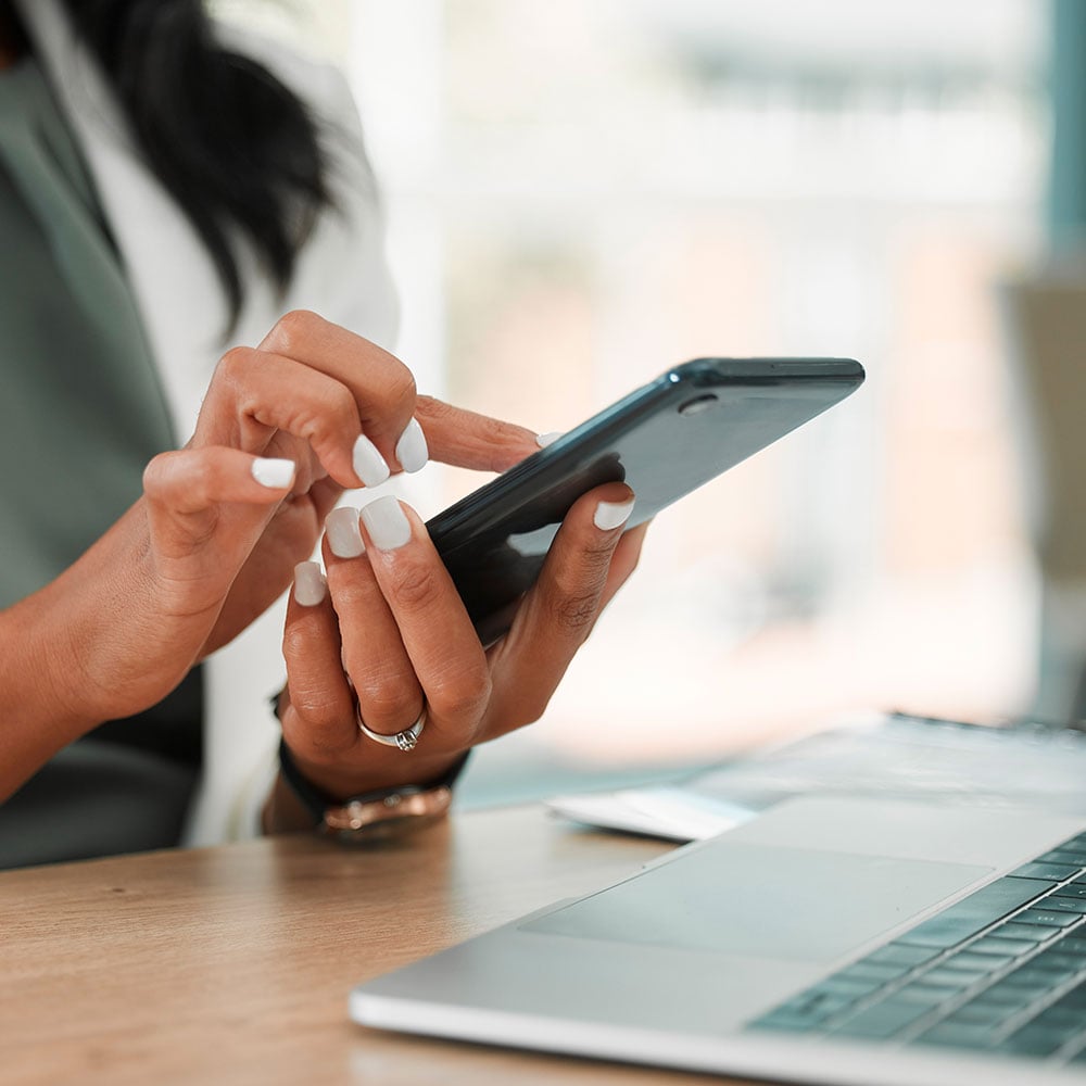 person on their mobile phone viewing their Quest Health results